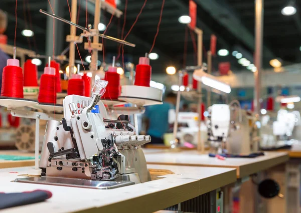 depositphotos_168324390-stock-photo-professional-overlock-machine-at-factory